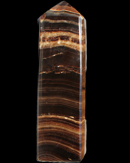 Chocolate Calcite obelisk 122*33mm 270g in sunlight - Rocks and Things Store