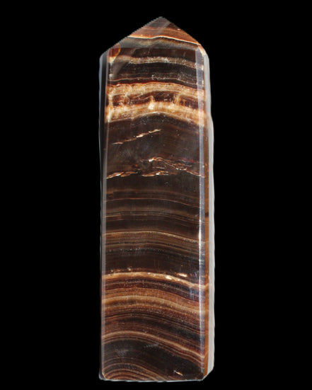 Chocolate Calcite obelisk 122*33mm 270g in sunlight - Rocks and Things Store