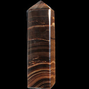 Chocolate Calcite obelisk 122*33mm 270g in sunlight - Rocks and Things Store