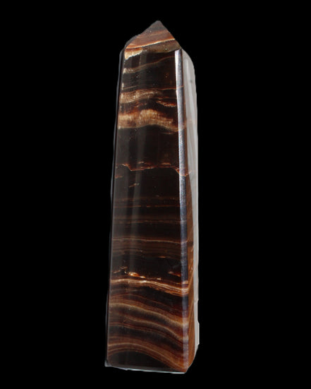 Chocolate Calcite obelisk 122*33mm 270g in sunlight - Rocks and Things Store