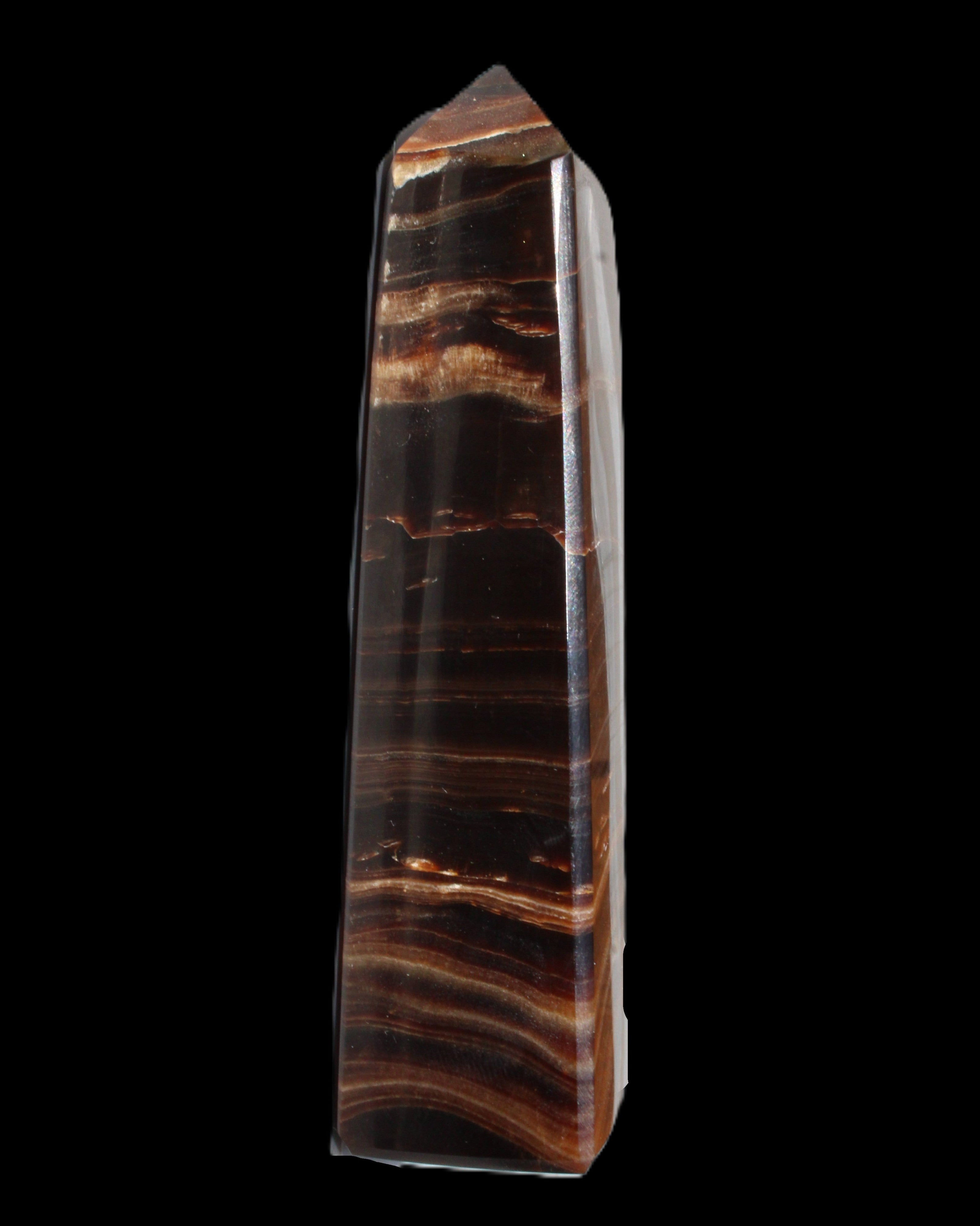 Chocolate Calcite obelisk 122*33mm 270g in sunlight - Rocks and Things Store