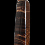 Chocolate Calcite obelisk 122*33mm 270g in sunlight - Rocks and Things Store