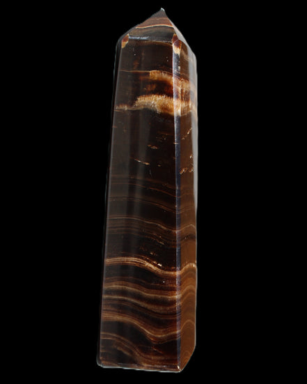 Chocolate Calcite obelisk 122*33mm 270g in sunlight - Rocks and Things Store