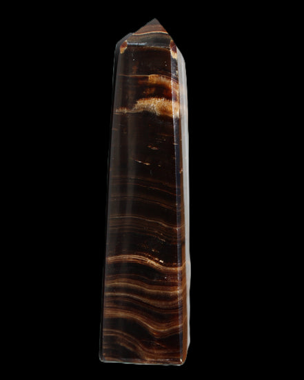 Chocolate Calcite obelisk 122*33mm 270g in sunlight - Rocks and Things Store
