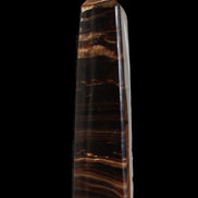 Chocolate Calcite obelisk 122*33mm 270g in sunlight - Rocks and Things Store
