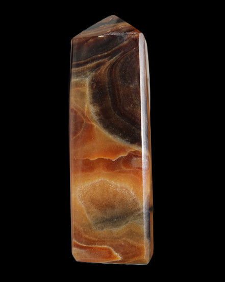 Chocolate Calcite obelisk 106*43mm 303g in sunlight - Rocks and Things Store