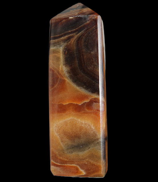 Chocolate Calcite obelisk 106*43mm 303g in sunlight - Rocks and Things Store