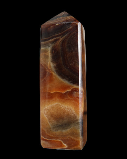 Chocolate Calcite obelisk 106*43mm 303g in sunlight - Rocks and Things Store