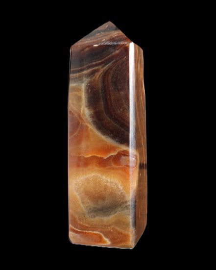 Chocolate Calcite obelisk 106*43mm 303g in sunlight - Rocks and Things Store