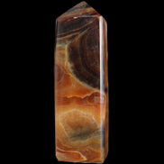 Chocolate Calcite obelisk 106*43mm 303g in sunlight - Rocks and Things Store