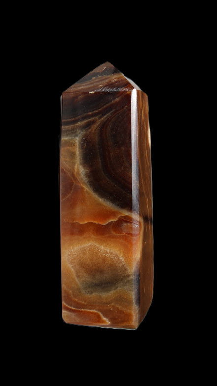 Chocolate Calcite obelisk 106*43mm 303g in sunlight - Rocks and Things Store