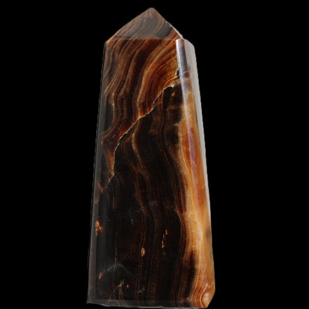 Chocolate Calcite obelisk 106*43mm 303g in sunlight - Rocks and Things Store
