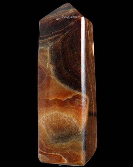 Chocolate Calcite obelisk 106*43mm 303g in sunlight - Rocks and Things Store