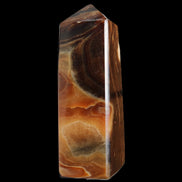 Chocolate Calcite obelisk 106*43mm 303g in sunlight - Rocks and Things Store