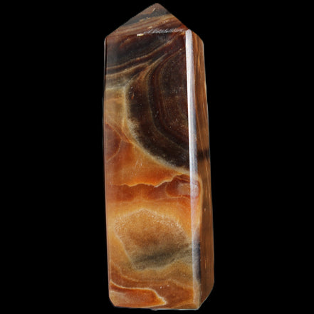 Chocolate Calcite obelisk 106*43mm 303g in sunlight - Rocks and Things Store