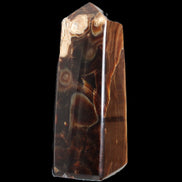Chocolate Calcite obelisk 106*43mm 303g in sunlight - Rocks and Things Store