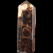 Chocolate Calcite obelisk 106*43mm 303g in sunlight - Rocks and Things Store