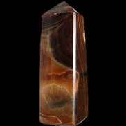 Chocolate Calcite obelisk 106*43mm 303g in sunlight - Rocks and Things Store