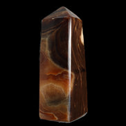 Chocolate Calcite obelisk 106*43mm 303g in sunlight - Rocks and Things Store