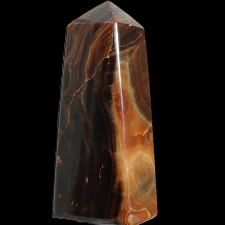 Chocolate Calcite obelisk 106*43mm 303g in sunlight - Rocks and Things Store