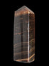 Chocolate Calcite obelisk 108*32mm 216g in sunlight - Rocks and Things Store