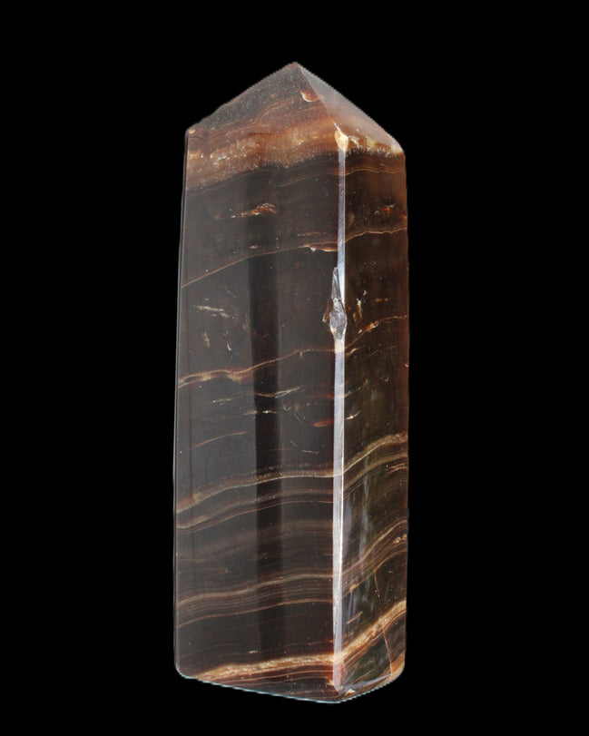 Chocolate Calcite obelisk 108*32mm 216g in sunlight - Rocks and Things Store