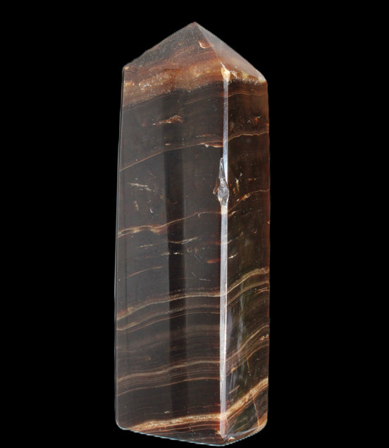 Chocolate Calcite obelisk 108*32mm 216g in sunlight - Rocks and Things Store