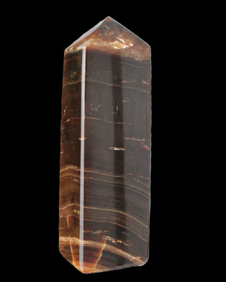 Chocolate Calcite obelisk 108*32mm 216g in sunlight - Rocks and Things Store