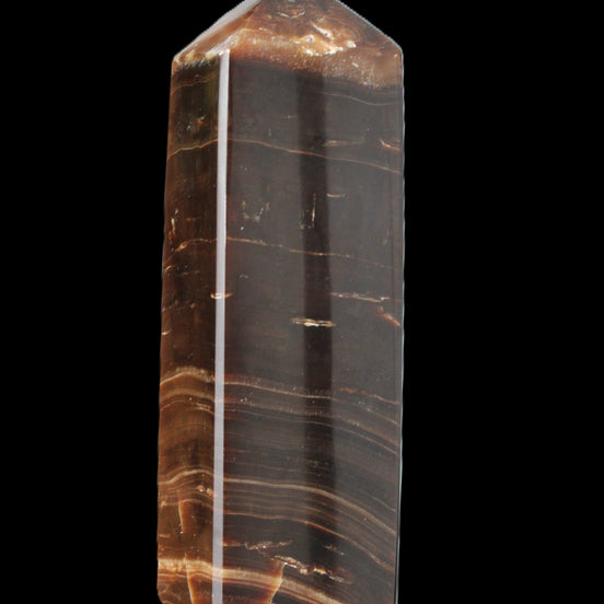 Chocolate Calcite obelisk 108*32mm 216g in sunlight - Rocks and Things Store