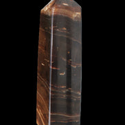 Chocolate Calcite obelisk 108*32mm 216g in sunlight - Rocks and Things Store