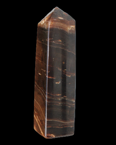 Chocolate Calcite obelisk 108*32mm 216g in sunlight - Rocks and Things Store