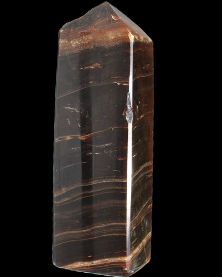 Chocolate Calcite obelisk 108*32mm 216g in sunlight - Rocks and Things Store