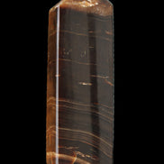 Chocolate Calcite obelisk 108*32mm 216g in sunlight - Rocks and Things Store
