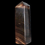 Chocolate Calcite obelisk 108*32mm 216g in sunlight - Rocks and Things Store