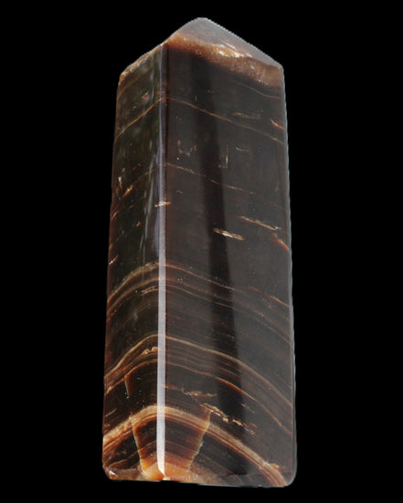 Chocolate Calcite obelisk 108*32mm 216g in sunlight - Rocks and Things Store