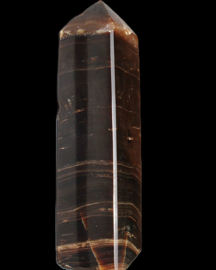 Chocolate Calcite obelisk 108*32mm 216g in sunlight - Rocks and Things Store