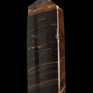 Chocolate Calcite obelisk 108*32mm 216g in sunlight - Rocks and Things Store