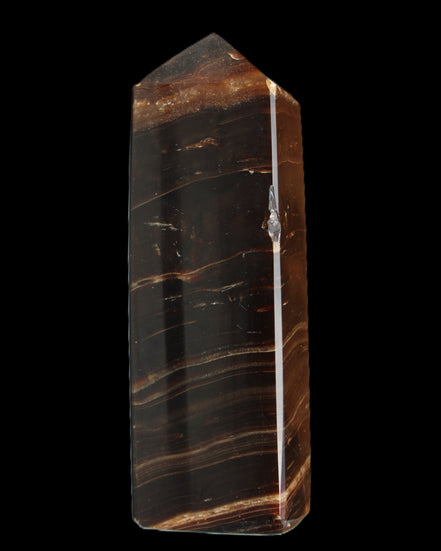 Chocolate Calcite obelisk 108*32mm 216g in sunlight - Rocks and Things Store