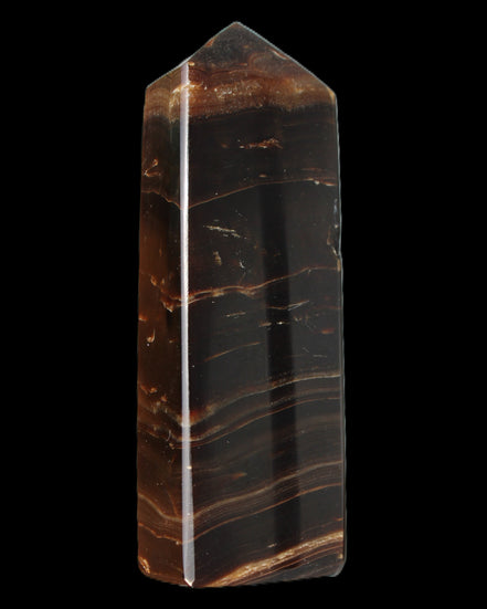 Chocolate Calcite obelisk 108*32mm 216g in sunlight - Rocks and Things Store