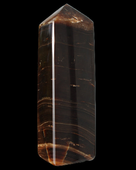 Chocolate Calcite obelisk 108*32mm 216g in sunlight - Rocks and Things Store