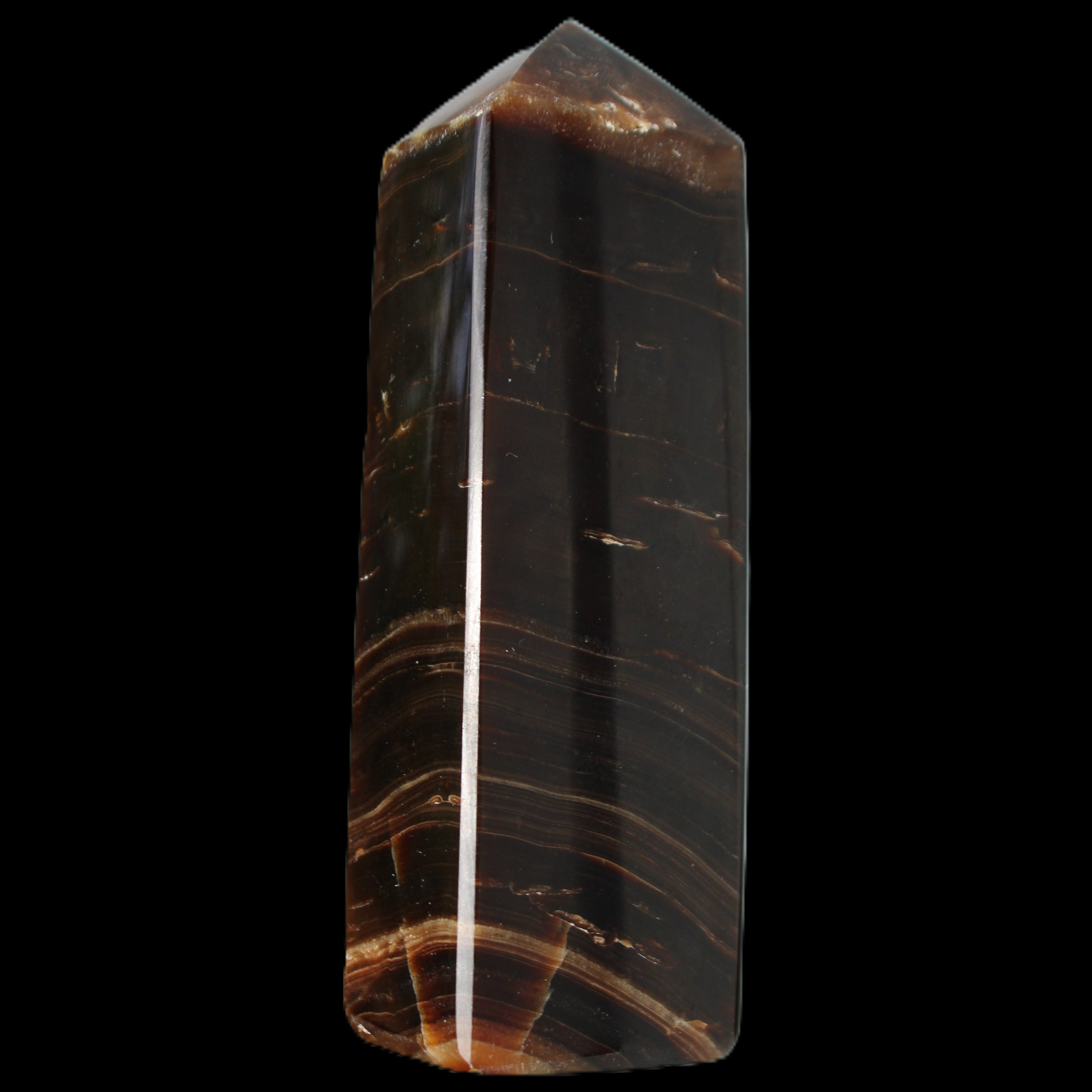 Chocolate Calcite obelisk 108*32mm 216g in sunlight - Rocks and Things Store