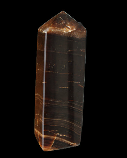 Chocolate Calcite obelisk 108*32mm 216g in sunlight - Rocks and Things Store