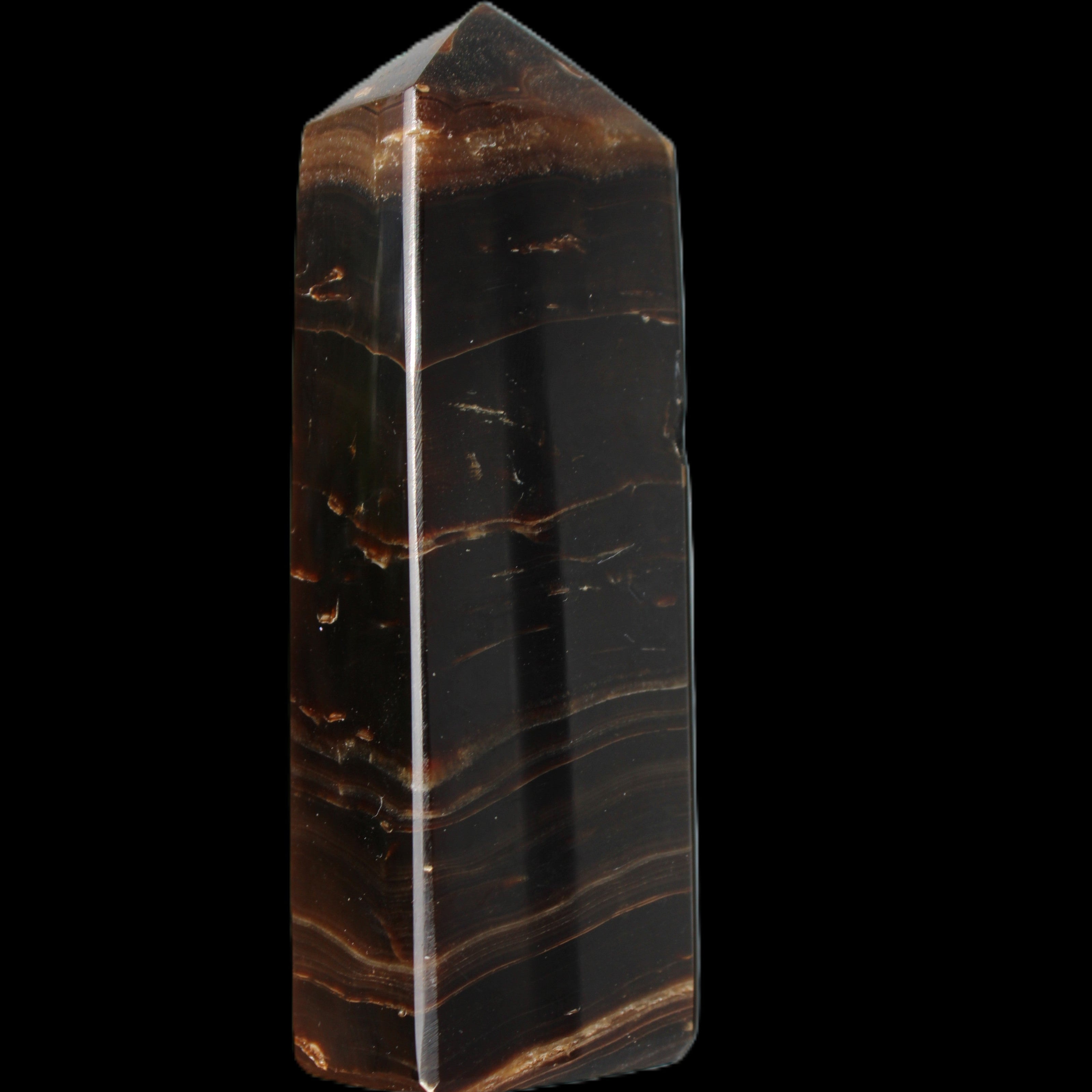 Chocolate Calcite obelisk 108*32mm 216g in sunlight - Rocks and Things Store