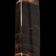 Chocolate Calcite obelisk 108*32mm 216g in sunlight - Rocks and Things Store