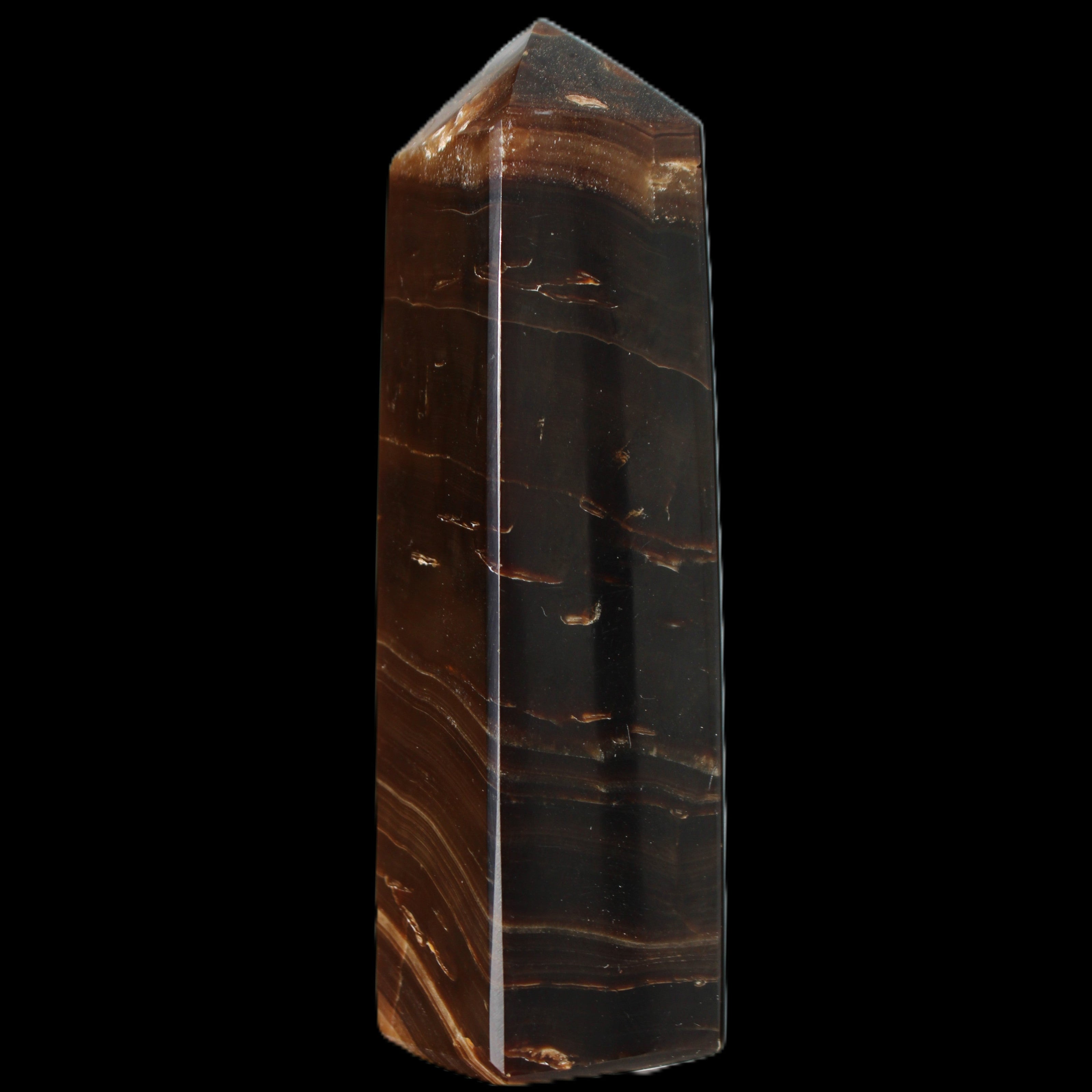 Chocolate Calcite obelisk 108*32mm 216g in sunlight - Rocks and Things Store