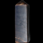 Chocolate Calcite obelisk 108*32mm 216g in sunlight - Rocks and Things Store
