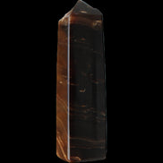 Chocolate Calcite obelisk 108*32mm 216g in sunlight - Rocks and Things Store