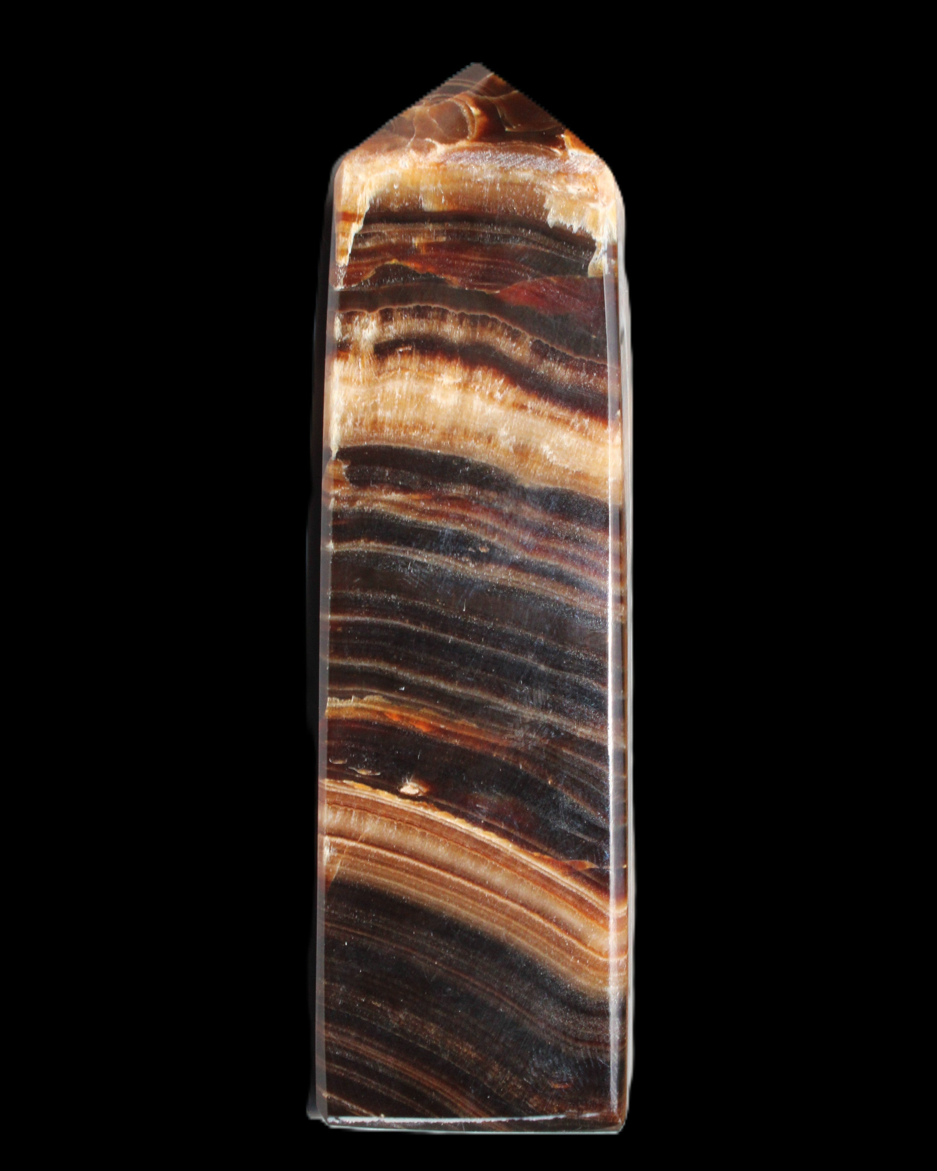 Chocolate Calcite obelisk 116*32mm 243g in sunlight - Rocks and Things Store