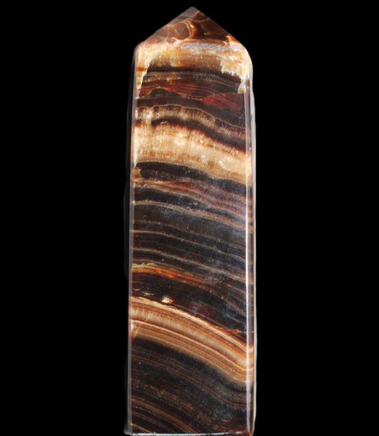 Chocolate Calcite obelisk 116*32mm 243g in sunlight - Rocks and Things Store