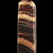 Chocolate Calcite obelisk 116*32mm 243g in sunlight - Rocks and Things Store